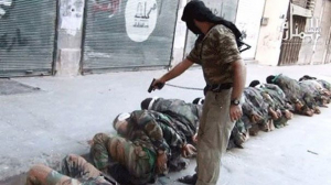 AKP'nin Suriye'de desteklediği çetelerin yaptıkları infazlardan bir görüntü