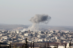 Smoke rises after airstrikes by pro-Syrian government forces in Anadan city